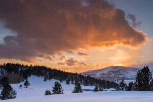 Coucher de soleil sur le plateau de la Calme - randonnée raquette